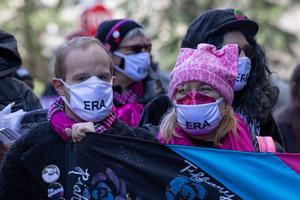 Demonstrators rally in Manhattan in support of the Equal Rights Amendment on the eve of International Women’s Day 2021. Demonstrators rally in Manhattan in support of the Equal Rights Amendment on the eve of International Women’s Day 2021.