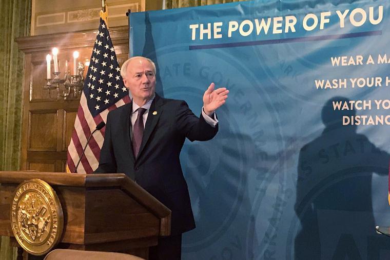 Arkansas Gov. Asa Hutchinson speaks about the coronavirus pandemic and vaccine distributions during a news conference at the state Capitol in Little Rock, Ark., on Tuesday, Jan. 12, 2021. Arkansas Gov. Asa Hutchinson speaks about the coronavirus pandemic and vaccine distributions during a news conference at the state Capitol in Little Rock, Ark., on Tuesday, Jan. 12, 2021.