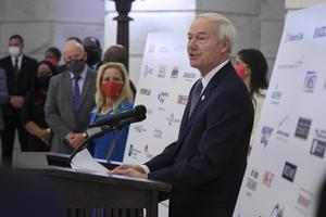 Arkansas Gov. Asa Hutchinson speaks Wednesday Aug. 19, 2020, in Little Rock, Ark., during a news conference at the Capitol to reveal a draft of a proposed hate-crime law that will be considered during the next legislative session. Arkansas Gov. Asa Hutchinson speaks Wednesday Aug. 19, 2020, in Little Rock, Ark., during a news conference at the Capitol to reveal a draft of a proposed hate-crime law that will be considered during the next legislative session.
