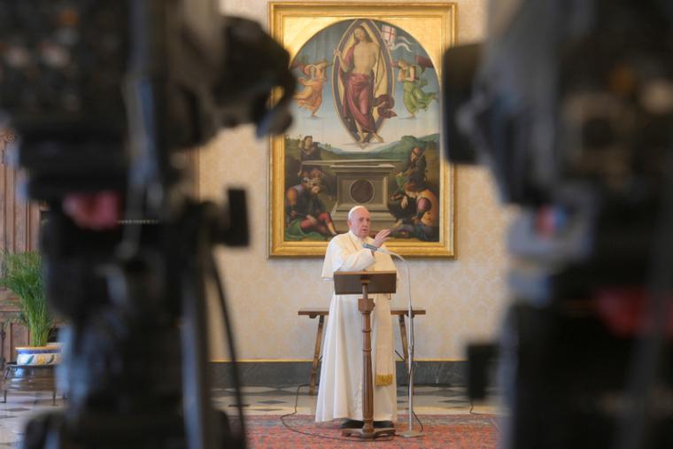 Pope Francis delivers a Regina Coeli address in the library of the Apostolic Palace. Pope Francis delivers a Regina Coeli address in the library of the Apostolic Palace.