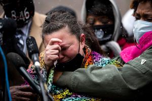 Naisha Wright (r) embraces Katie Wright (c), the mother of Daunte Wright, as she speaks during a news conference outside the Hennepin County Government Center on April 13 in Minneapolis. Daunte Wright was shot and killed by Brooklyn Center police officer Kimberly Potter on Sunday. Naisha Wright (r) embraces Katie Wright (c), the mother of Daunte Wright, as she speaks during a news conference outside the Hennepin County Government Center on April 13 in Minneapolis. Daunte Wright was shot and killed by Brooklyn Center police officer Kimberly Potter on Sunday.