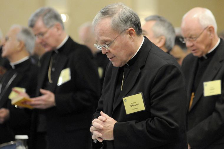 Bishop Michael J. Hoeppner of Crookston, Minn. prays during a semi-annual meeting of the United States Conference of Catholic Bishops, in Baltimore on Nov. 10, 2008. Bishop Michael J. Hoeppner of Crookston, Minn. prays during a semi-annual meeting of the United States Conference of Catholic Bishops, in Baltimore on Nov. 10, 2008.