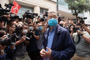 Hong Kong media tycoon and founder of Apple Daily newspaper Jimmy Lai Chee Ying arrives at the West Kowloon Magistrates' Court. Hong Kong media tycoon and founder of Apple Daily newspaper Jimmy Lai Chee Ying arrives at the West Kowloon Magistrates' Court.