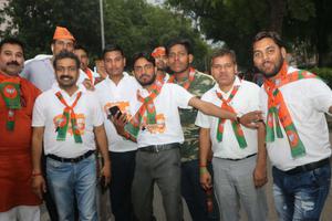 BJP supporters rejoice in front of party office in New Delhi after May 2019 reelection victory BJP supporters rejoice in front of party office in New Delhi after May 2019 reelection victory