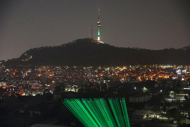 Greenpeace activists project a laser message saying “Leaders Save Earth, Save Us” Wednesday in Seoul, South Korea. President Biden has invited 40 world leaders, including Pope Francis, to participate in the Leaders Summit on Climate and is hoping to reach deals with some of the world’s largest greenhouse gas emitters. Greenpeace activists project a laser message saying “Leaders Save Earth, Save Us” Wednesday in Seoul, South Korea. President Biden has invited 40 world leaders, including Pope Francis, to participate in the Leaders Summit on Climate and is hoping to reach deals with some of the world’s largest greenhouse gas emitters.
