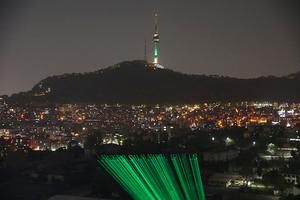 Greenpeace activists project a laser message saying “Leaders Save Earth, Save Us” Wednesday in Seoul, South Korea. President Biden has invited 40 world leaders, including Pope Francis, to participate in the Leaders Summit on Climate and is hoping to reach deals with some of the world’s largest greenhouse gas emitters. Greenpeace activists project a laser message saying “Leaders Save Earth, Save Us” Wednesday in Seoul, South Korea. President Biden has invited 40 world leaders, including Pope Francis, to participate in the Leaders Summit on Climate and is hoping to reach deals with some of the world’s largest greenhouse gas emitters.