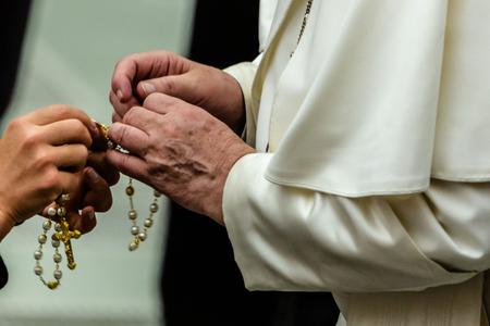 Pope Francis holds a rosary after the Wednesday general audience inside the Vatican's Paul VI Hall, Aug. 7, 2019. Pope Francis holds a rosary after the Wednesday general audience inside the Vatican's Paul VI Hall, Aug. 7, 2019.