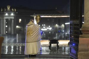 Pope Francis carries the Blessed Sacrament at the entrance of St. Peter's Basilica, during a televised holy hour with Eucharistic Adoration and an extraordinary Urbi et Orbi blessing in response to the coronavirus pandemic, March 27, 2020. Pope Francis carries the Blessed Sacrament at the entrance of St. Peter's Basilica, during a televised holy hour with Eucharistic Adoration and an extraordinary Urbi et Orbi blessing in response to the coronavirus pandemic, March 27, 2020.