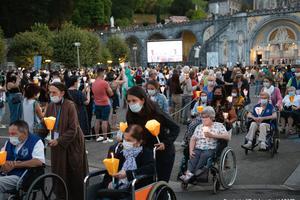 Pilgrims at the Sanctuary Our Lady of Lourdes in France. Pilgrims at the Sanctuary Our Lady of Lourdes in France.