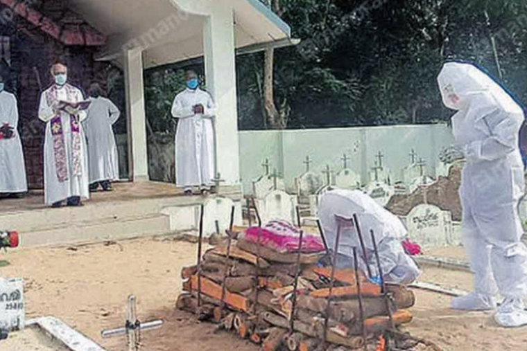 A funeral service during the height of the coronavirus pandemic in Kerala. A funeral service during the height of the coronavirus pandemic in Kerala.