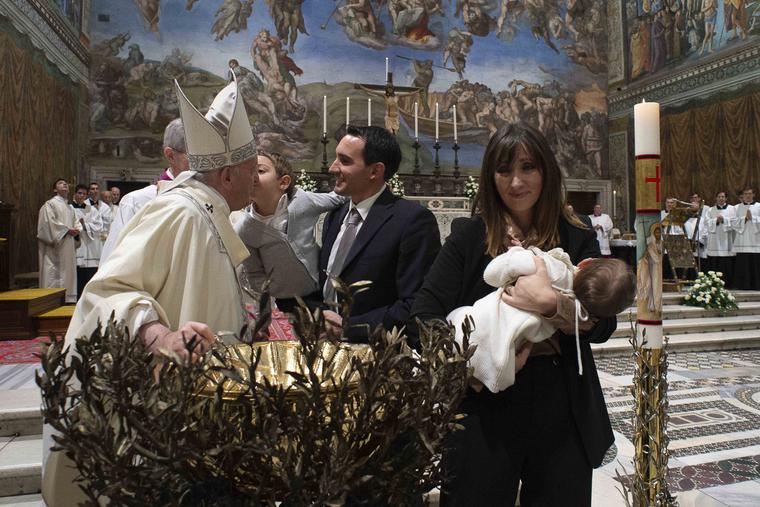 Pope Francis baptizes a child in the Sistine Chapel on the feast of the Baptism of the Lord on Jan. 12, 2020. Pope Francis baptizes a child in the Sistine Chapel on the feast of the Baptism of the Lord on Jan. 12, 2020.