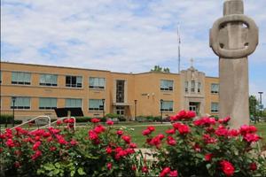 Cathedral High School terminated Joshua Payne-Elliott’s contract in June 2019. After reaching a settlement with the school, he filed a lawsuit against the archdiocese in August 2019. Cathedral High School terminated Joshua Payne-Elliott’s contract in June 2019. After reaching a settlement with the school, he filed a lawsuit against the archdiocese in August 2019.
