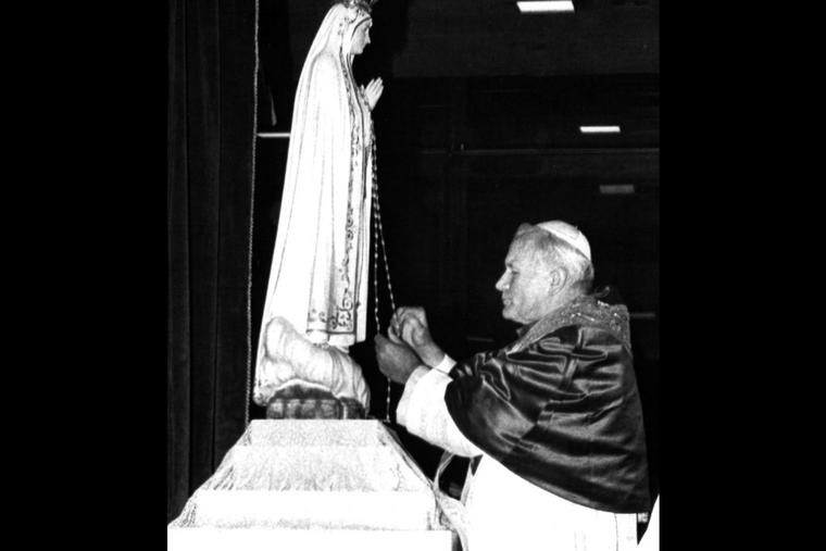 Pope John Paul II prays in front of the statue of the Virgin Mary at the Chapel of the Apparitions in Fatima on May 13, 1982. The Pope visited the shrine to give thanks for surviving the 1981 assassination attempt, when he was shot in St. Peter’s Square. Pope John Paul II prays in front of the statue of the Virgin Mary at the Chapel of the Apparitions in Fatima on May 13, 1982. The Pope visited the shrine to give thanks for surviving the 1981 assassination attempt, when he was shot in St. Peter’s Square.