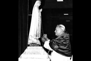 Pope John Paul II prays in front of the statue of the Virgin Mary at the Chapel of the Apparitions in Fatima on May 13, 1982. The Pope visited the shrine to give thanks for surviving the 1981 assassination attempt, when he was shot in St. Peter’s Square. Pope John Paul II prays in front of the statue of the Virgin Mary at the Chapel of the Apparitions in Fatima on May 13, 1982. The Pope visited the shrine to give thanks for surviving the 1981 assassination attempt, when he was shot in St. Peter’s Square.