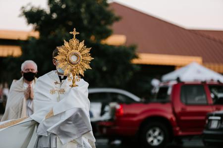 A 2020 procession of the Most Holy Eucharist takes place outside during the COVID-19 pandemic in Overland Park, Kansas. By the Solemnity of Corpus Christi on June 6, many dioceses in the U.S. will be reinstating the Sunday obligation
to return to Mass, and parishes will be able to resume the tradition of Eucharistic processions. A 2020 procession of the Most Holy Eucharist takes place outside during the COVID-19 pandemic in Overland Park, Kansas. By the Solemnity of Corpus Christi on June 6, many dioceses in the U.S. will be reinstating the Sunday obligation
to return to Mass, and parishes will be able to resume the tradition of Eucharistic processions.