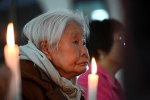Chinese Catholics attend Easter Vigil Mass near Beijing on April 3. Chinese Catholics attend Easter Vigil Mass near Beijing on April 3.