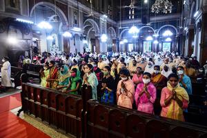 Catholics gather for prayer during Mass at St. Joseph’s Cathedral on the eve of Good Friday in Allahabad on April 1. Catholics gather for prayer during Mass at St. Joseph’s Cathedral on the eve of Good Friday in Allahabad on April 1.