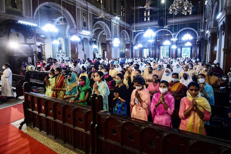 Catholics gather for prayer during Mass at St. Joseph’s Cathedral on the eve of Good Friday in Allahabad on April 1. Catholics gather for prayer during Mass at St. Joseph’s Cathedral on the eve of Good Friday in Allahabad on April 1.