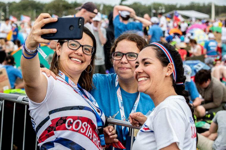 Pilgrims await Pope Francis' arrival in Panama City's Campo San Juan Pablo II for the Vigil ceremony at World Youth Day on Jan. 26, 2019. Pilgrims await Pope Francis' arrival in Panama City's Campo San Juan Pablo II for the Vigil ceremony at World Youth Day on Jan. 26, 2019.