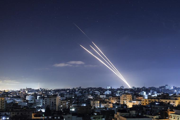 Rockets are launched toward Israel from Gaza City, controlled by the Palestinian Hamas movement, on May 18. Heavy airstrikes and rocket fire in the Israel-Gaza conflict claimed more lives on both sides. Rockets are launched toward Israel from Gaza City, controlled by the Palestinian Hamas movement, on May 18. Heavy airstrikes and rocket fire in the Israel-Gaza conflict claimed more lives on both sides.