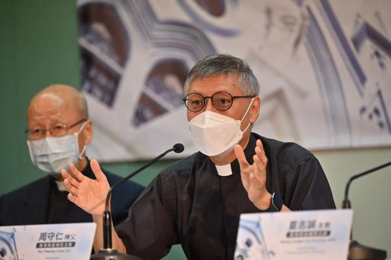 Newly appointed Bishop of Hong Kong Rev. Stephen Chow (R) speaks at a press conference with Cardinal John Tong (L) in Hong Kong on May 18, 2021. Newly appointed Bishop of Hong Kong Rev. Stephen Chow (R) speaks at a press conference with Cardinal John Tong (L) in Hong Kong on May 18, 2021.