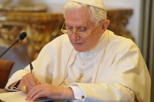 Pope Benedict XVI is shown writing on Aug. 28, 2010. Pope Benedict XVI is shown writing on Aug. 28, 2010.
