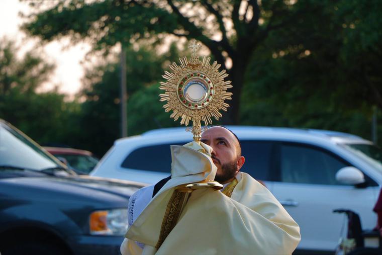 Outdoor adoration takes place during the COVID-19 pandemic in Richardson, Texas. Outdoor adoration takes place during the COVID-19 pandemic in Richardson, Texas.