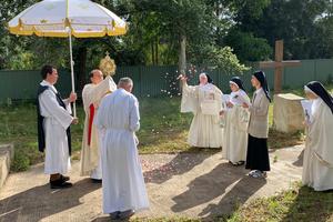 Father John Rizzo leads a Eucharistic procession with the Tyburn Nuns in Parramatta, Australia. Father John Rizzo leads a Eucharistic procession with the Tyburn Nuns in Parramatta, Australia.