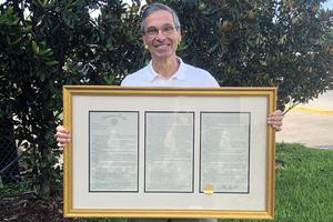Louisiana Sen. Fred Mills, Jr. holds a copy of the Louisiana Senate’s St. Joseph Resolution. Louisiana Sen. Fred Mills, Jr. holds a copy of the Louisiana Senate’s St. Joseph Resolution.