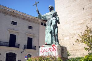 A statue of St. Junípero Serra is pictured June 22 in Palma de Mallorca, Spain, after it was sprayed with graffiti reading "Racist." A statue of St. Junípero Serra is pictured June 22 in Palma de Mallorca, Spain, after it was sprayed with graffiti reading "Racist."