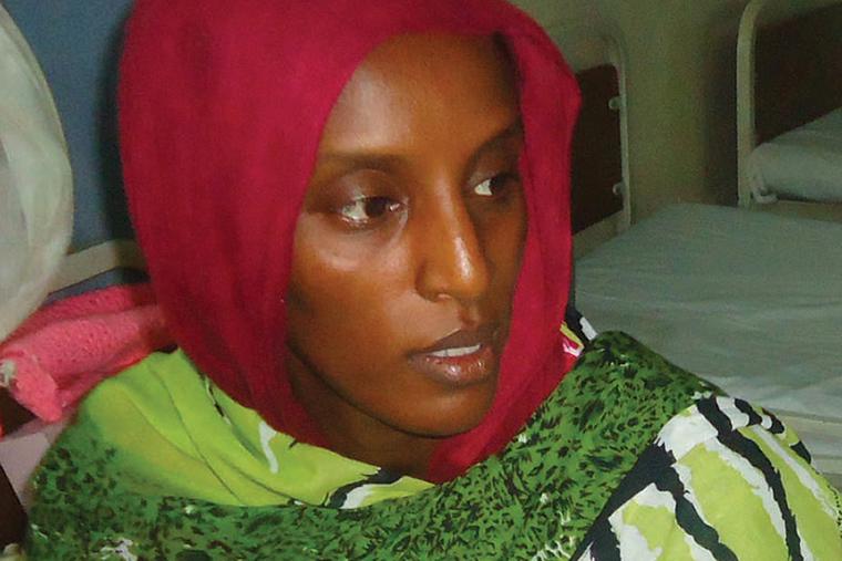 Meriam Yahia Ibrahim Ishag, a Christian Sudanese woman sentenced to hang for apostasy, sits in her cell a day after she gave birth to a baby girl at a women's prison in Khartoum's twin city of Omdurman on May 28, 2014. Meriam Yahia Ibrahim Ishag, a Christian Sudanese woman sentenced to hang for apostasy, sits in her cell a day after she gave birth to a baby girl at a women's prison in Khartoum's twin city of Omdurman on May 28, 2014.