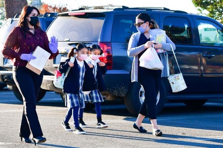 Students arrive at St. Joseph Catholic School in La Puente, California, on Nov. 16, 2020. Students arrive at St. Joseph Catholic School in La Puente, California, on Nov. 16, 2020.