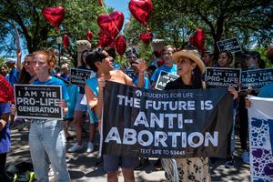 Pro-life group Students for Life members stand near the gate of the Texas Capitol at a protest May 29 in Austin, Texas, just after Gov. Greg Abbott signed a fetal heartbeat bill. Pro-life group Students for Life members stand near the gate of the Texas Capitol at a protest May 29 in Austin, Texas, just after Gov. Greg Abbott signed a fetal heartbeat bill.