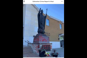 Vandalized statue of Pope John Paul II at Holy Rosary Catholic Church in Edmonton. Vandalized statue of Pope John Paul II at Holy Rosary Catholic Church in Edmonton.