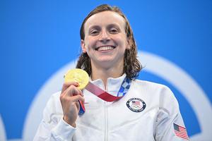 Gold medalist USA's Kathleen Ledecky poses with her medal after the final of the women's 800m freestyle swimming event during the Tokyo 2020 Olympic Games at the Tokyo Aquatics Centre in Tokyo on July 31, 2021. Gold medalist USA's Kathleen Ledecky poses with her medal after the final of the women's 800m freestyle swimming event during the Tokyo 2020 Olympic Games at the Tokyo Aquatics Centre in Tokyo on July 31, 2021.