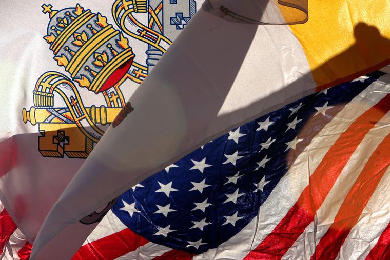 The U.S. flag and the flag of Vatican City fly outside Nationals Park before Pope Benedict XVI’s visit to Washington, DC, April 15, 2008. The U.S. flag and the flag of Vatican City fly outside Nationals Park before Pope Benedict XVI’s visit to Washington, DC, April 15, 2008.
