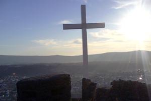 A cross stands at an abandoned Italian fort overlooking the city of Široki-Brijeg in Bosnia-Herzegovina A cross stands at an abandoned Italian fort overlooking the city of Široki-Brijeg in Bosnia-Herzegovina