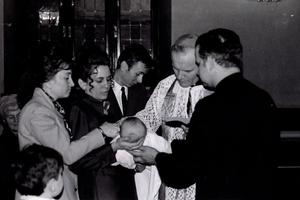 Cardinal Karol Wojtyla, the future Pope St. John Paul II, baptizes a child in a file photo from 1971. Cardinal Karol Wojtyla, the future Pope St. John Paul II, baptizes a child in a file photo from 1971.