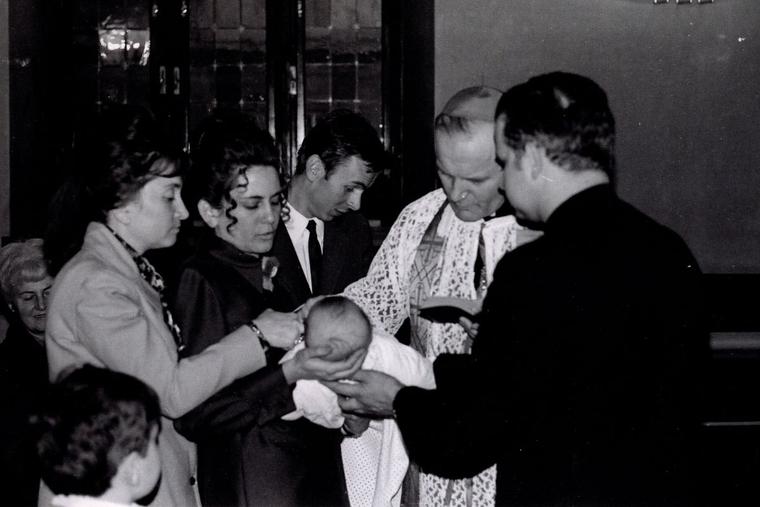 Cardinal Karol Wojtyla, the future Pope St. John Paul II, baptizes a child in a file photo from 1971. Cardinal Karol Wojtyla, the future Pope St. John Paul II, baptizes a child in a file photo from 1971.