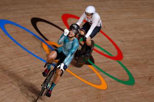 Hong Kong's Lee Wai Sze (front) celebrates after taking bronze in the women's track cycling sprint finals ahead of Germany's Emma Hinze during the Tokyo 2020 Olympic Games at Izu Velodrome in Izu, Japan, on Aug. 8. Hong Kong's Lee Wai Sze (front) celebrates after taking bronze in the women's track cycling sprint finals ahead of Germany's Emma Hinze during the Tokyo 2020 Olympic Games at Izu Velodrome in Izu, Japan, on Aug. 8.