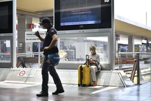 A police officer stands inside Porta Nuova Station on Sept. 1 in Turin, Italy. Italy has imposed a 'Green Pass' for the use of means of transport such as buses, trains, airplanes and ferries as of Sept. 1. A police officer stands inside Porta Nuova Station on Sept. 1 in Turin, Italy. Italy has imposed a 'Green Pass' for the use of means of transport such as buses, trains, airplanes and ferries as of Sept. 1.