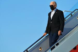 President Joe Biden steps off Air Force One upon arrival at Andrews Air Force Base in Maryland on Tuesday.
