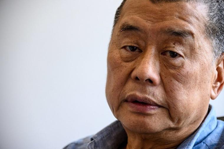 In this photo taken on June 16, 2020, Hong Kong pro-democracy media mogul Jimmy Lai, 72, poses during an interview with AFP at the Next Digital offices in Hong Kong. Lai was arrested under a new national security law on Aug. 10, 2020, and police raided his newspaper offices in a deepening crackdown on dissent in the Chinese city. He was sentenced to 14 months in prison this past April. In this photo taken on June 16, 2020, Hong Kong pro-democracy media mogul Jimmy Lai, 72, poses during an interview with AFP at the Next Digital offices in Hong Kong. Lai was arrested under a new national security law on Aug. 10, 2020, and police raided his newspaper offices in a deepening crackdown on dissent in the Chinese city. He was sentenced to 14 months in prison this past April.