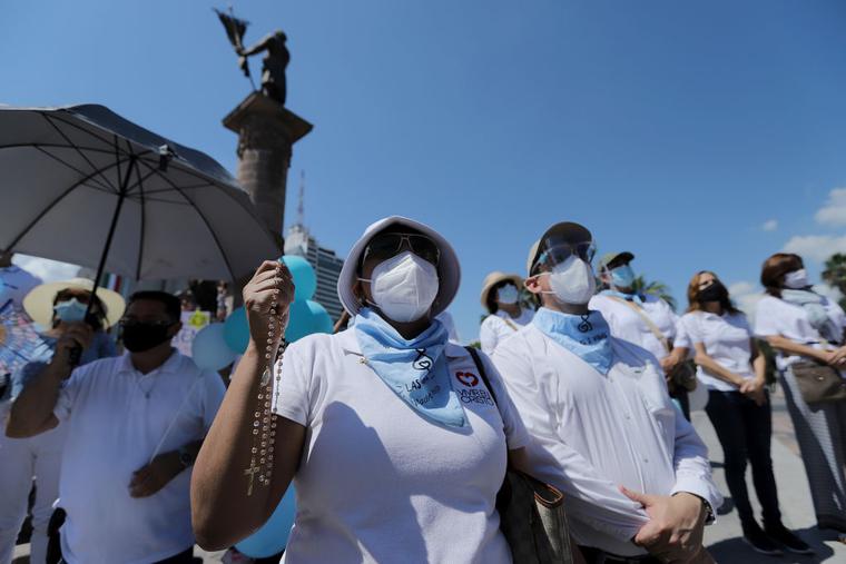 Pro-life activists shout slogans during a demonstration to protest the decriminalization of abortion at Macroplaza on September 12, 2021 in Monterrey, Mexico. Pro-life activists shout slogans during a demonstration to protest the decriminalization of abortion at Macroplaza on September 12, 2021 in Monterrey, Mexico.