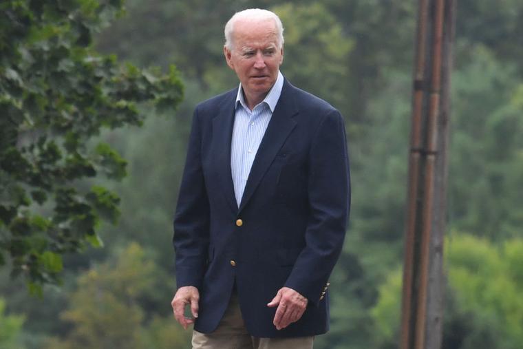 President Joe Biden returns to his car after attending service at Saint Joseph's Cathlic Church in Wilmington, Delaware on August 7, 2021. President Joe Biden returns to his car after attending service at Saint Joseph's Cathlic Church in Wilmington, Delaware on August 7, 2021.