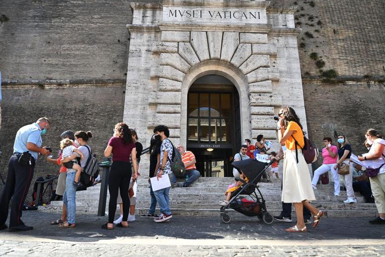 Visitors queue to show their Covid-19 certificates for scanning before entering the Vatican Museums in the Vatican on August 6, 2021, as Italy made the Green Pass, which is an extension of the EU's digital Covid certificate, required from today to enter cinemas, museums and indoor sports venues, or eat indoors at restaurants. Visitors queue to show their Covid-19 certificates for scanning before entering the Vatican Museums in the Vatican on August 6, 2021, as Italy made the Green Pass, which is an extension of the EU's digital Covid certificate, required from today to enter cinemas, museums and indoor sports venues, or eat indoors at restaurants.