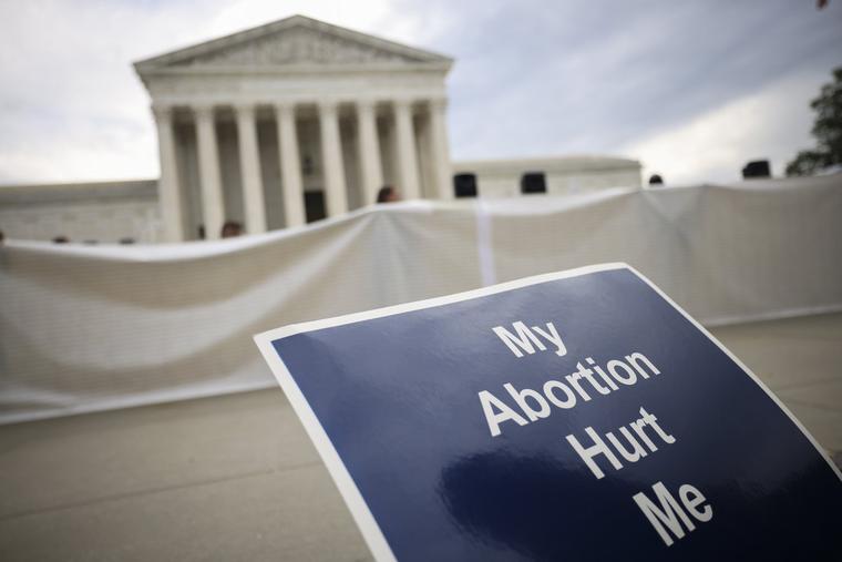 Anti-abortion activists demonstrate outside the U.S. Supreme Court building Monday in Washington, DC. Anti-abortion activists demonstrate outside the U.S. Supreme Court building Monday in Washington, DC.