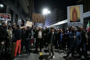 People protest against the so-called Green Pass in Milan on October 16, 2021 as all workers must show since October 15 a so-called Green Pass, offering proof of vaccination, recent recovery from Covid-19 or a negative test, or face being declared absent without pay. People protest against the so-called Green Pass in Milan on October 16, 2021 as all workers must show since October 15 a so-called Green Pass, offering proof of vaccination, recent recovery from Covid-19 or a negative test, or face being declared absent without pay.