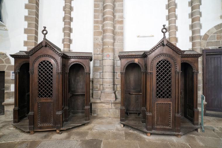 Confessionals in the Abbey Sainte-Croix in Quimperle, Brittany. Confessionals in the Abbey Sainte-Croix in Quimperle, Brittany.