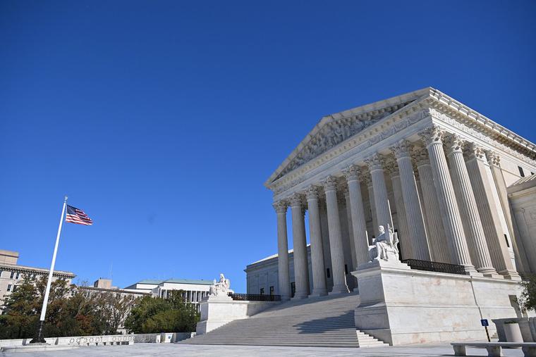The U.S. Supreme Court is seen in Washington on Nov. 1, the day the high court heard challenges to the Texas Heartbeat Law. The U.S. Supreme Court is seen in Washington on Nov. 1, the day the high court heard challenges to the Texas Heartbeat Law.